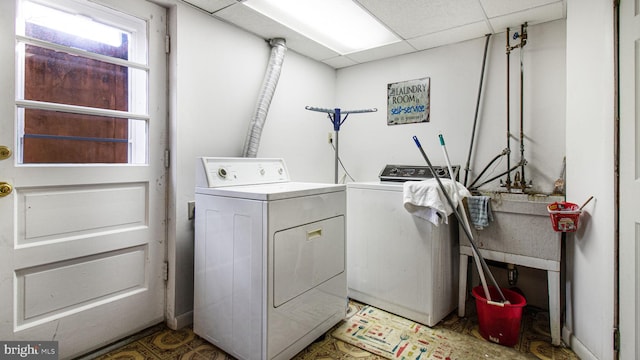 washroom with washing machine and dryer