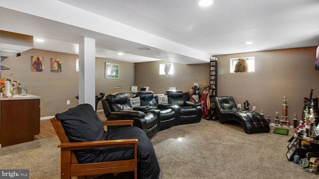 interior space featuring plenty of natural light and carpet flooring