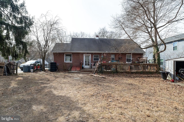 view of front of property with a wooden deck