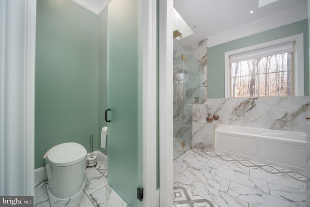 full bathroom featuring ornamental molding, marble finish floor, toilet, and a bath