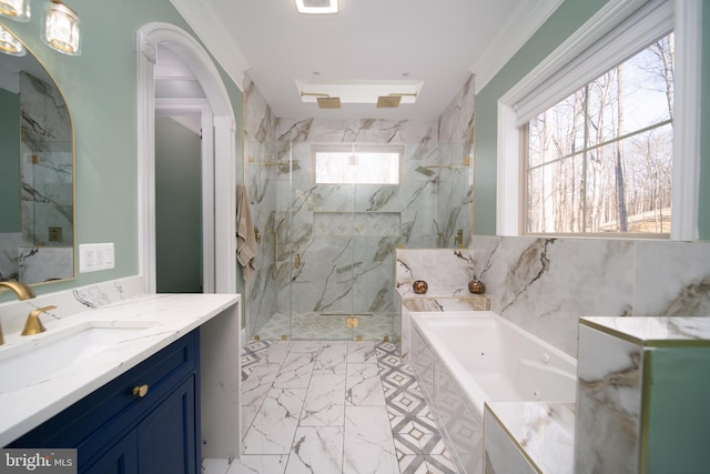 bathroom with vanity, marble finish floor, ornamental molding, a marble finish shower, and a tub with jets