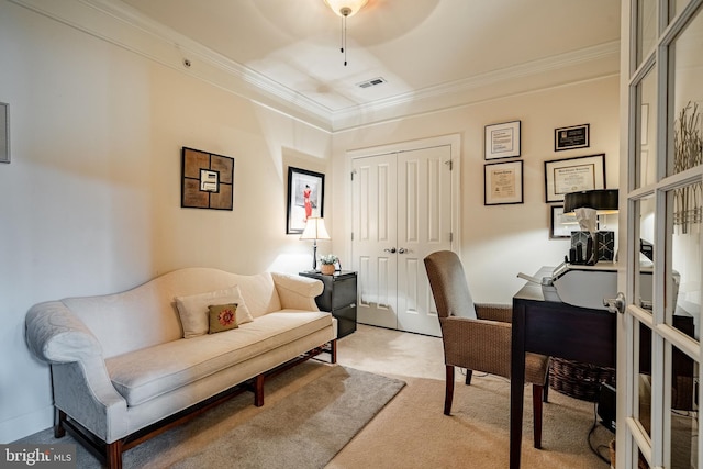 home office with ornamental molding and light carpet