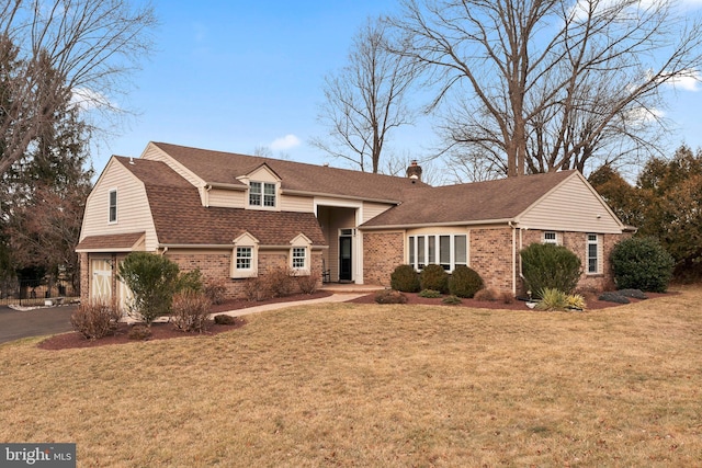 view of front of home with a front yard