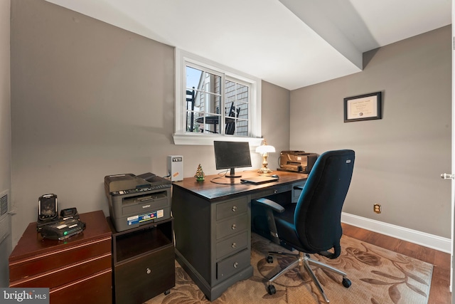 home office featuring hardwood / wood-style flooring