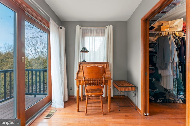 sitting room featuring light wood-type flooring