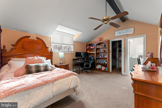 bedroom with vaulted ceiling with beams, light carpet, and ceiling fan