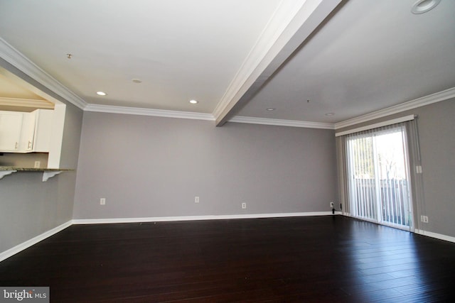 unfurnished living room with ornamental molding and dark hardwood / wood-style floors