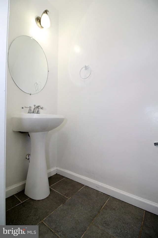 bathroom featuring tile patterned flooring