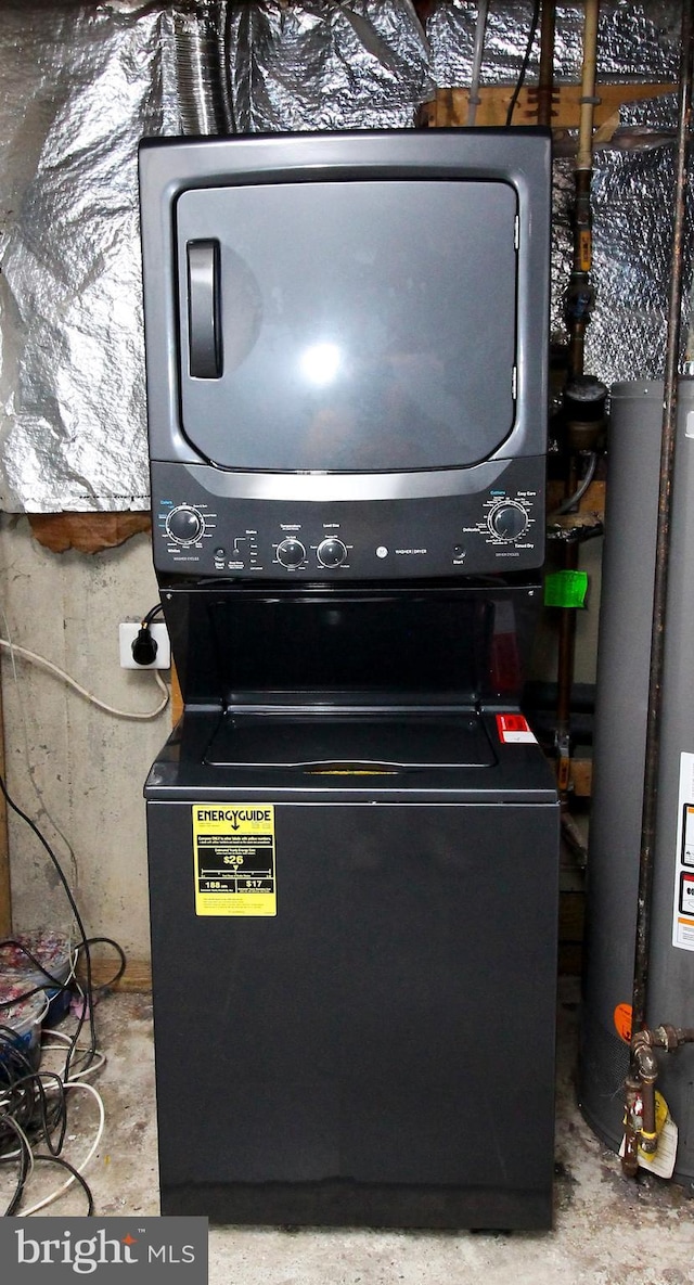 details with stacked washer and dryer and water heater