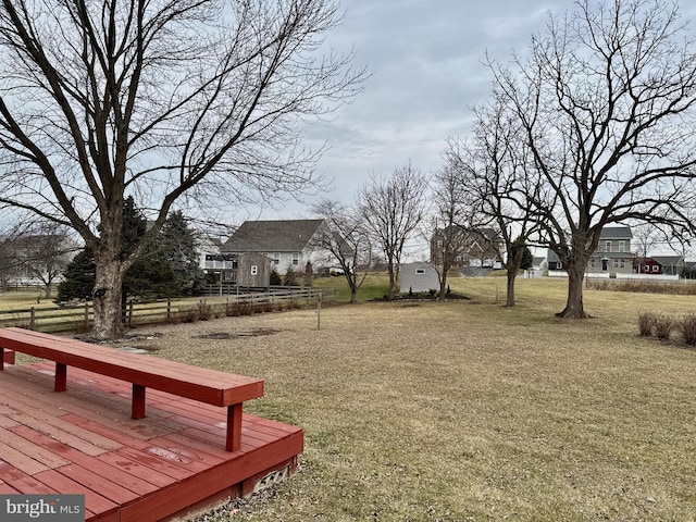 view of yard with a wooden deck