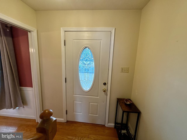 foyer entrance with hardwood / wood-style floors