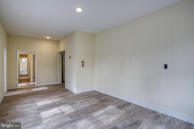 unfurnished room featuring light wood-type flooring