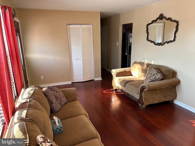 living room featuring dark hardwood / wood-style floors