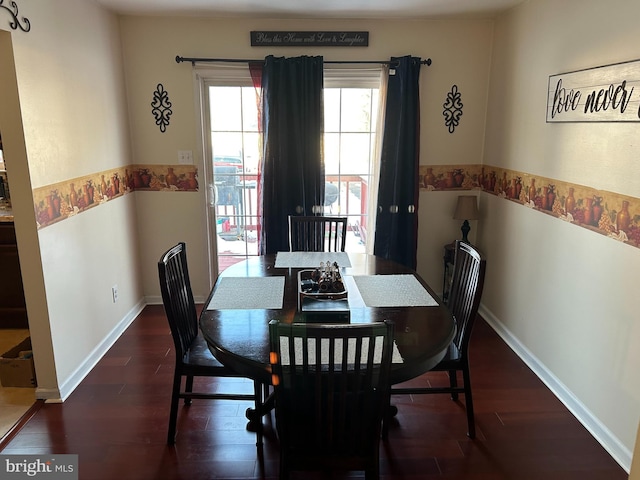 dining room featuring dark wood-type flooring