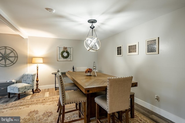 dining room featuring wood-type flooring