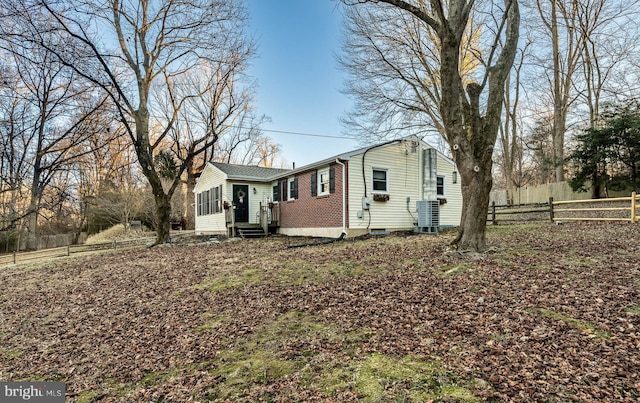 exterior space featuring central air condition unit