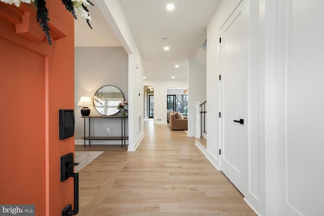 hallway featuring light hardwood / wood-style floors