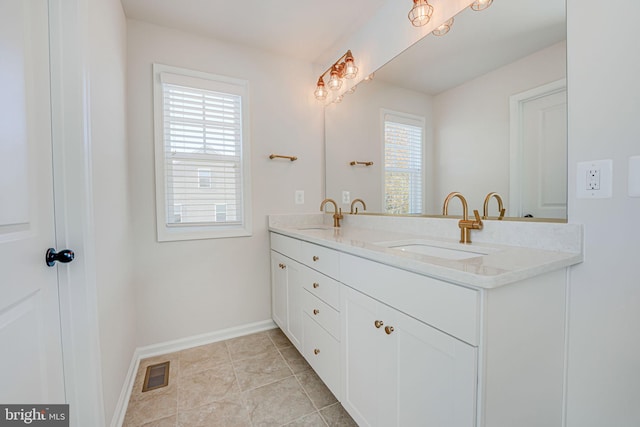 bathroom featuring vanity and tile patterned floors