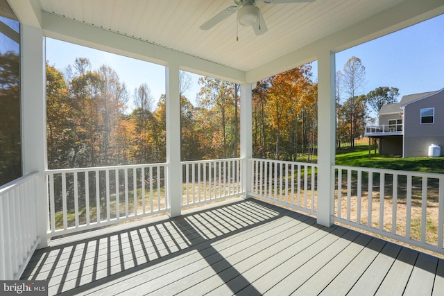 wooden deck with ceiling fan