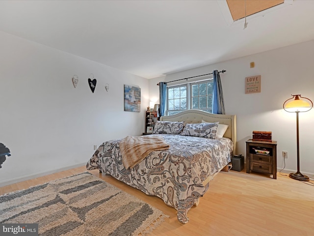 bedroom featuring light hardwood / wood-style floors