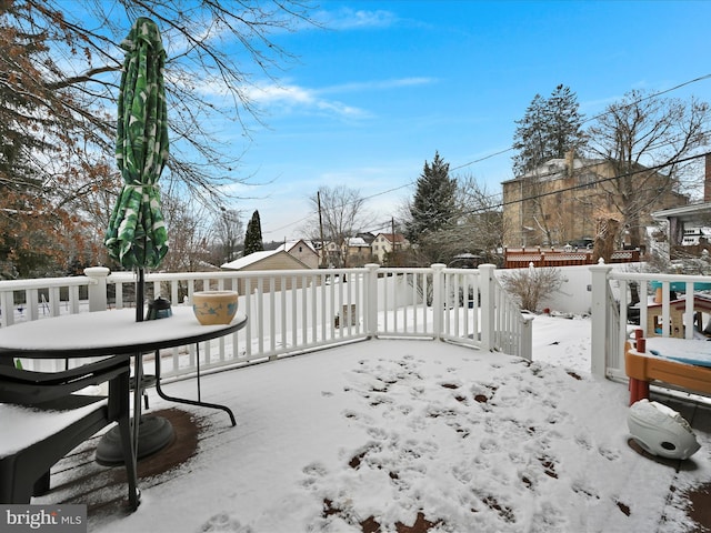 view of snow covered deck