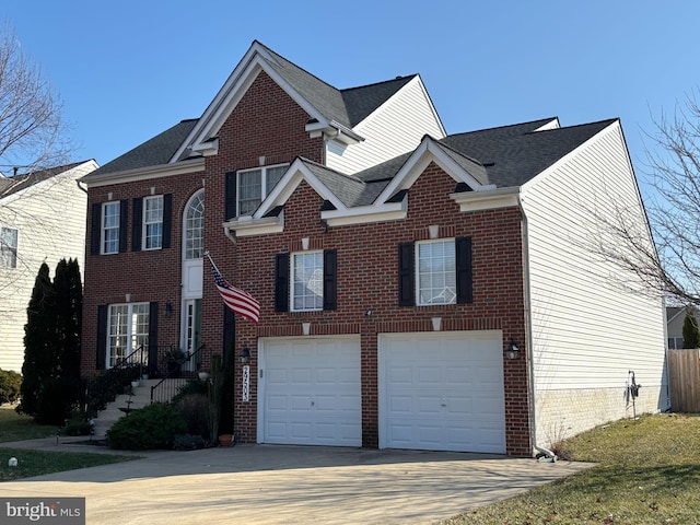 view of front of property with a garage