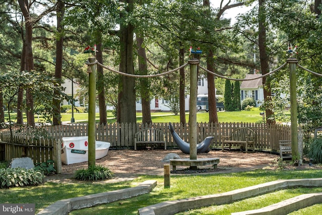 view of playground with a yard