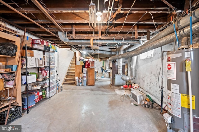 basement with heating unit and gas water heater