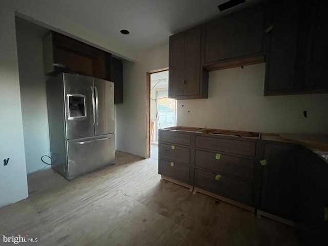 kitchen featuring stainless steel fridge