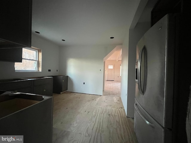 kitchen featuring stainless steel fridge