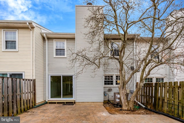 rear view of house featuring a patio