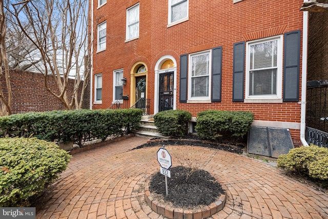 doorway to property featuring a patio area