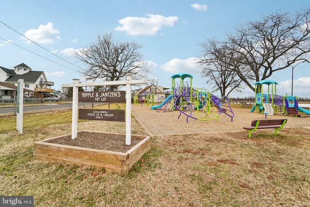 view of playground featuring a yard