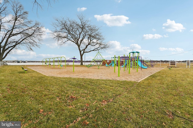 view of jungle gym featuring a lawn