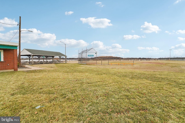 view of yard with a gazebo and a rural view