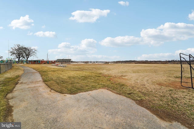 view of yard with a rural view