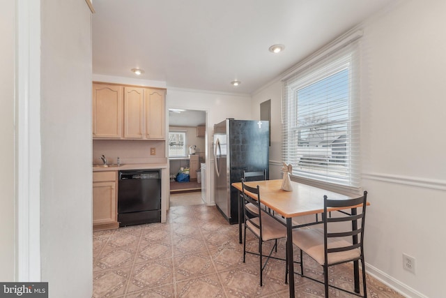 kitchen with sink, stainless steel fridge, black dishwasher, ornamental molding, and light brown cabinets