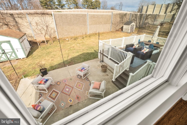 exterior space featuring a storage shed and an outdoor hangout area