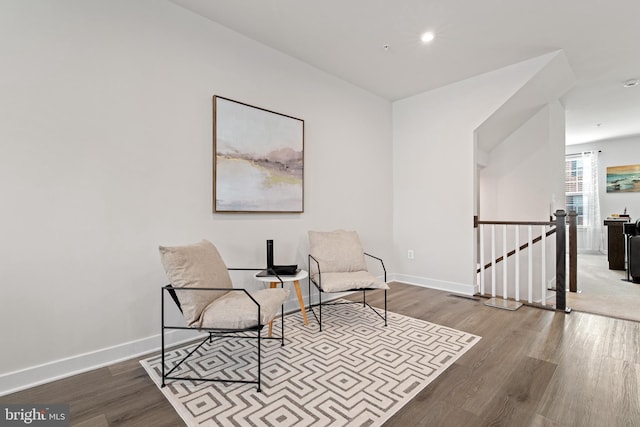 living area featuring hardwood / wood-style flooring