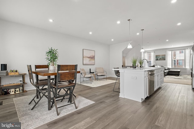 dining space featuring hardwood / wood-style floors