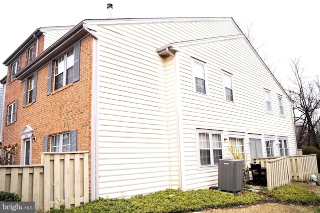 view of property exterior with central air condition unit