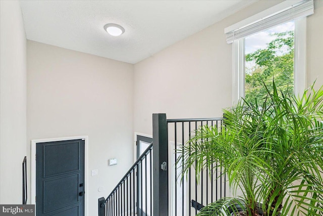 interior space with a balcony