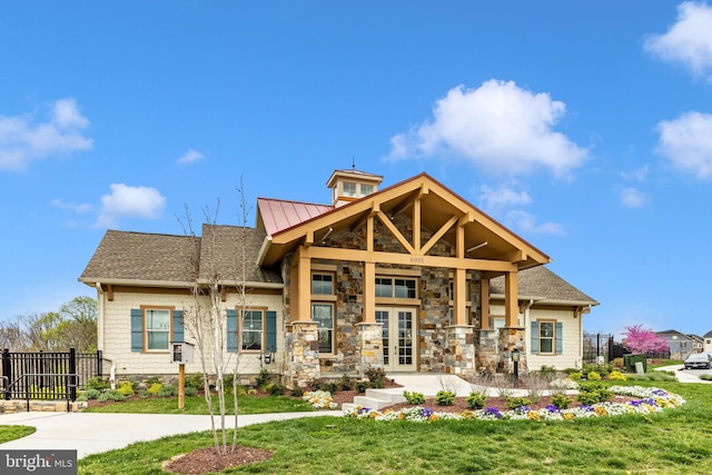 exterior space with a porch and a lawn