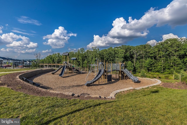 view of play area with a yard