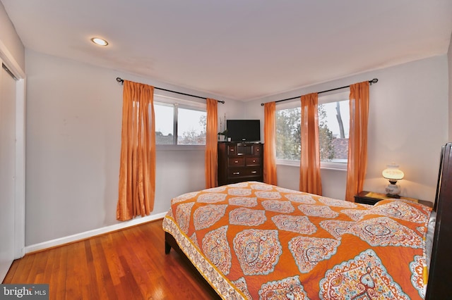 bedroom featuring hardwood / wood-style flooring