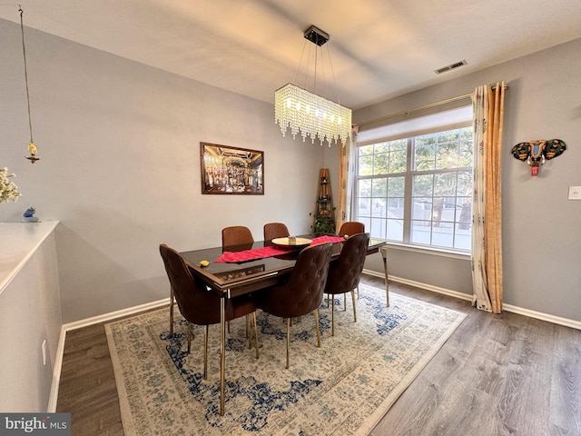 dining area featuring hardwood / wood-style floors