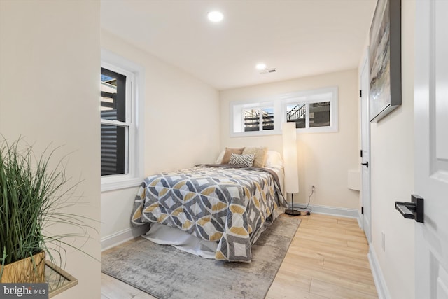 bedroom featuring light hardwood / wood-style floors