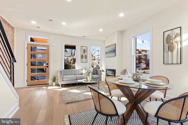 dining space featuring light hardwood / wood-style flooring