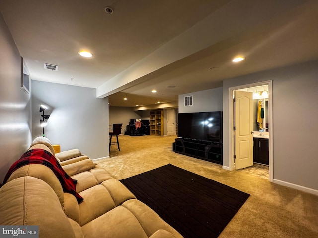 living area featuring recessed lighting, light colored carpet, visible vents, and baseboards