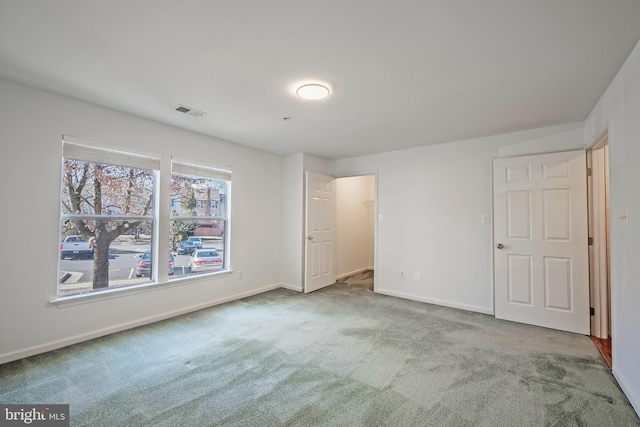 unfurnished bedroom with carpet floors